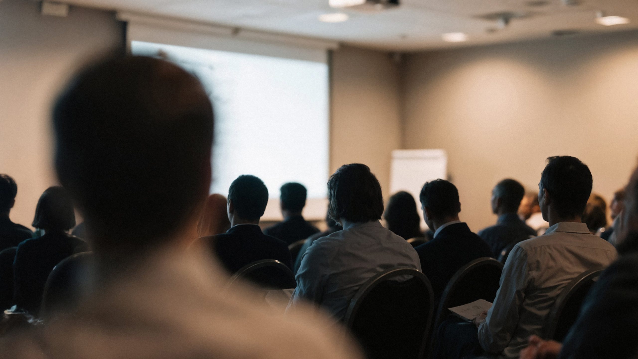 Presentatie op podium voor sportvoeding lezing