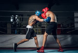 Two boxers fight during a sparring session in the boxing ring