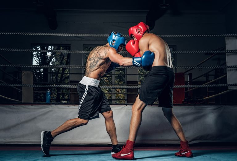 Two boxers fight during a sparring session in the boxing ring
